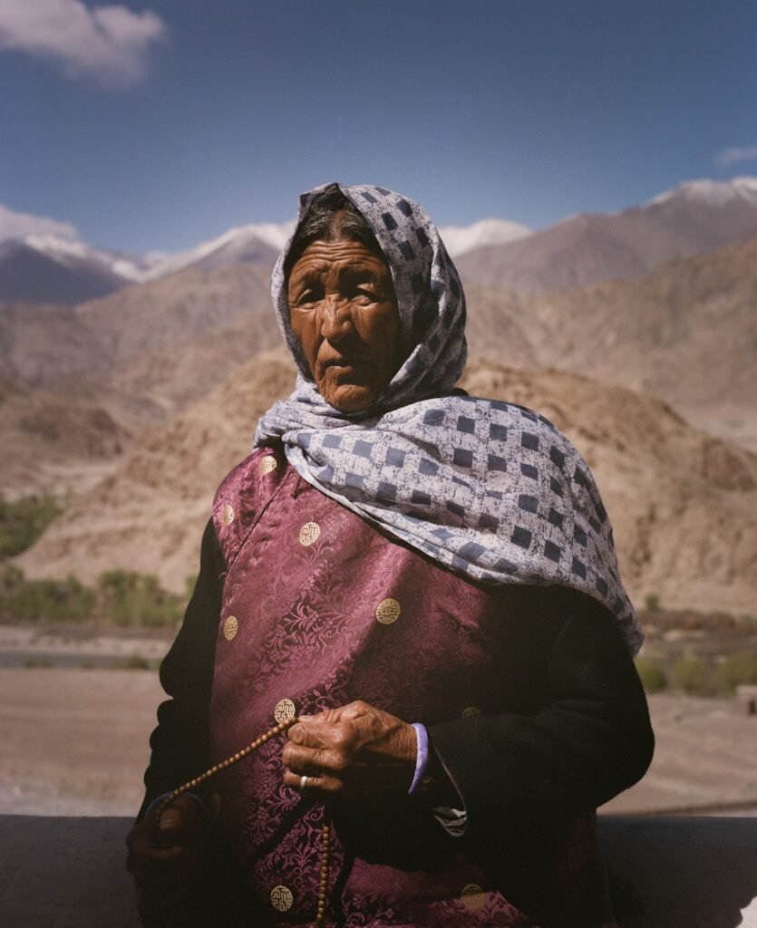 A woman in front of the mountains of Ladakh