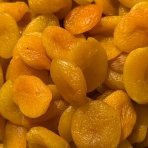 A pile of golden sun-dried apricots